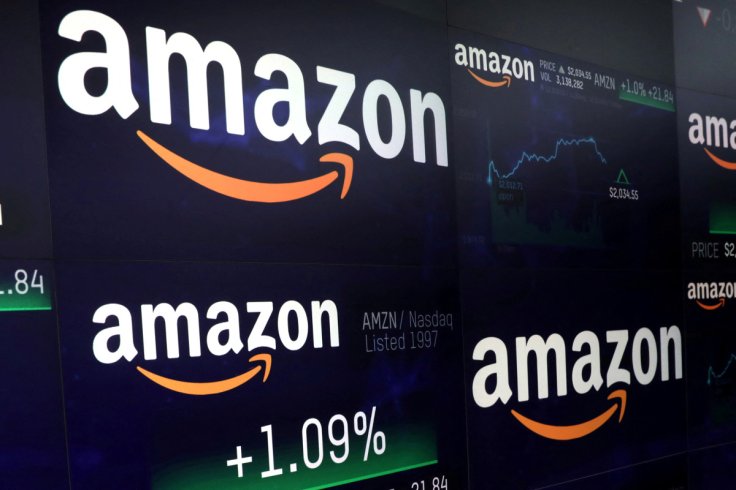 The Amazon.com logo and stock price information is seen on screens at the Nasdaq Market Site in New York City